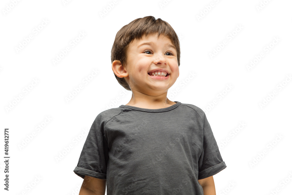 Sincere. Happy, smiley little caucasian boy isolated on white studio background with copyspace for ad. Looks happy, cheerful. Childhood, education, human emotions, facial expression concept. Sincere. Happy, smiley little caucasian boy isolated on white studio background with copyspace for ad. Looks happy, cheerful. Childhood, education, human emotions, facial expression concept.
