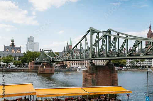 фотографія Historical pedestrian Eiserner Steg, Iron footbridge over the Main river, consis