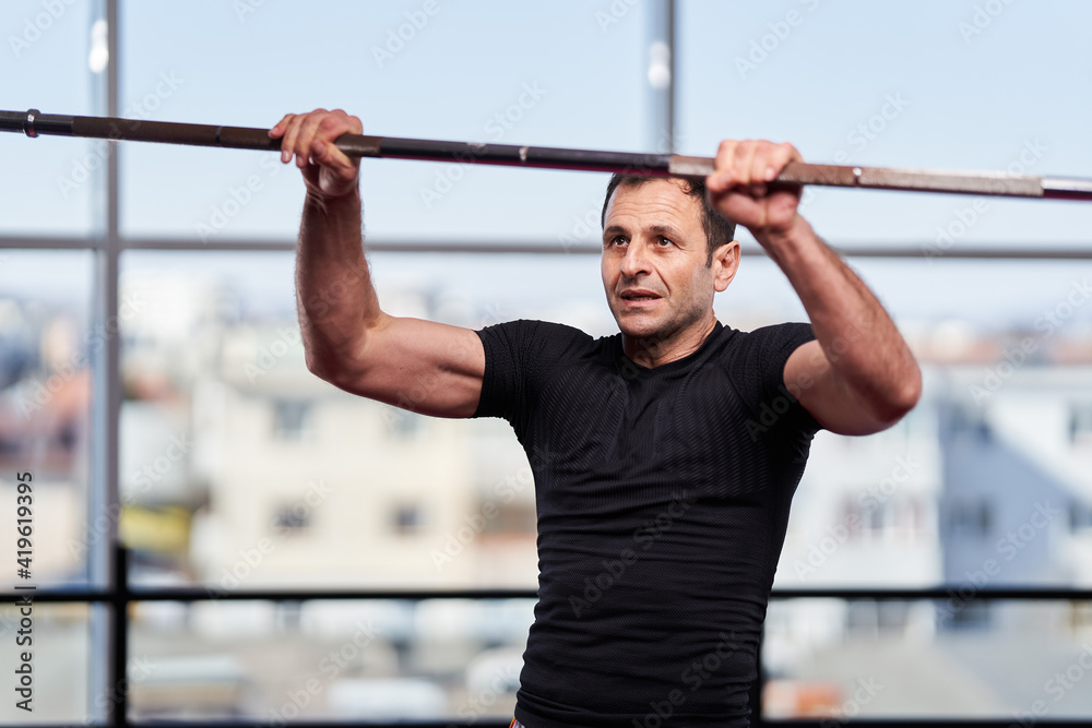 Kickboxer doing conditioning training Kickboxer doing conditioning training