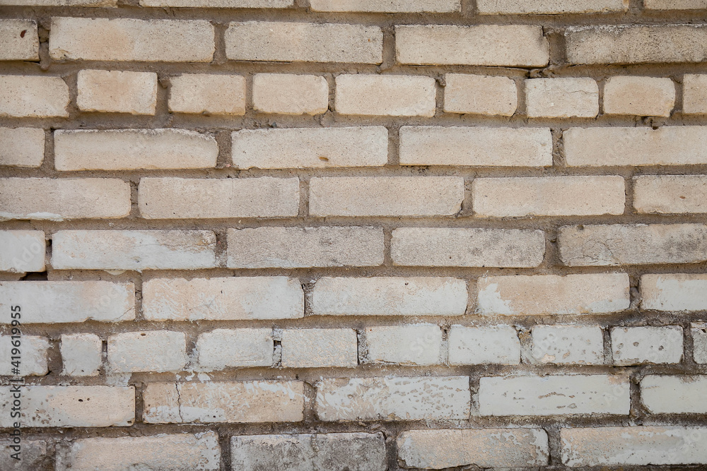 White old industrial brick background. Wall of building material close-up. Copy space for site