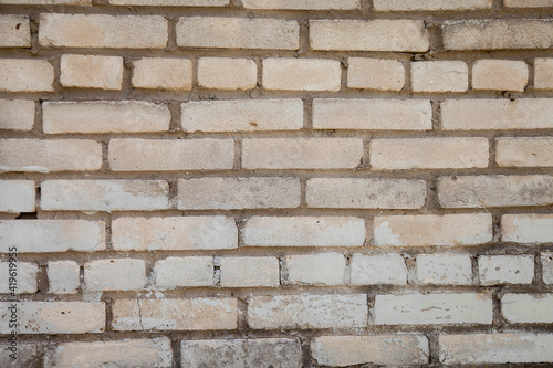 White old industrial brick background. Wall of building material close-up. Copy space for site