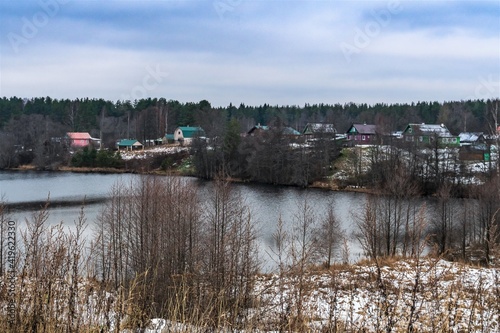 Russia, Lodeinoe Pole, December 2020. A village on the shore of a lake near an Orthodox monastery.