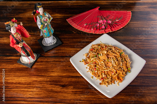 A plate of oriental food special fried rice