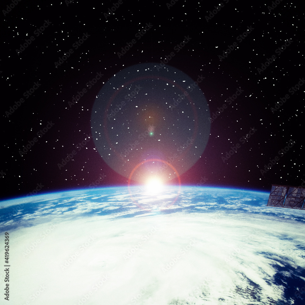 Amazing sunrise from space at night. The elements of this image furnished by NASA. Amazing sunrise from space at night. The elements of this image furnished by NASA.
