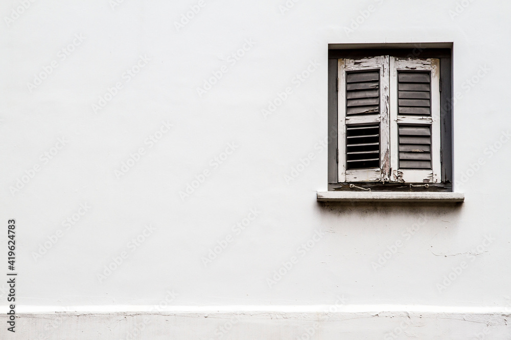 old window with shutters