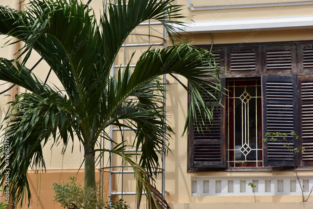 row of ancient brown weathered window shutters. antique wooden windows as background