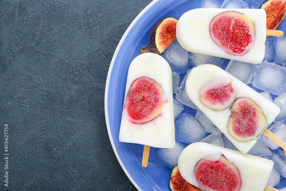 Plate with delicious fig ice-cream on dark background Plate with delicious fig ice-cream on dark background