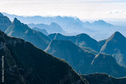 Silhouettes of Santa Catarina mountains at sunrise, seen from the funnels canyon