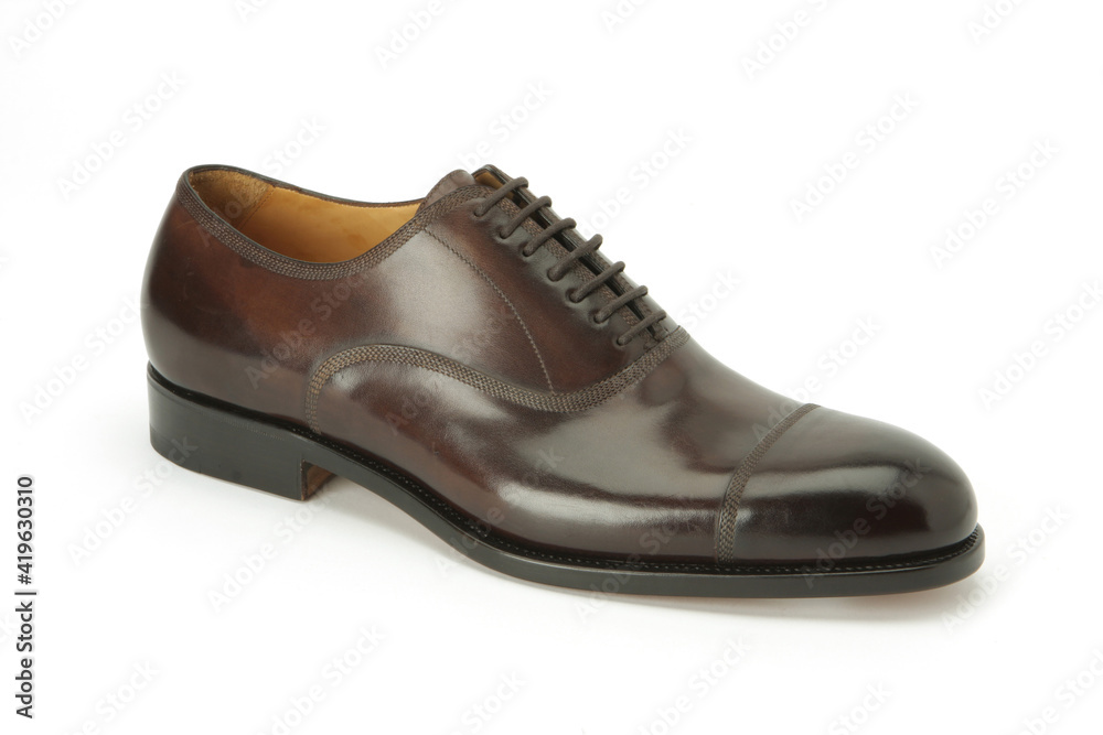 Elegant footwear personal accessory for men studio shoot Elegant footwear personal accessory for men studio shoot