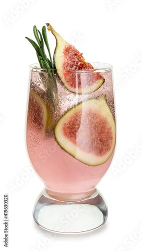 Glass of tasty fig lemonade on white background