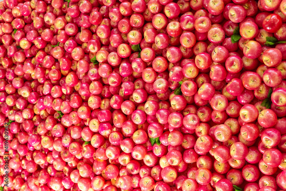 Apples background, a lot of red apples, texture, many fruits Apples background, a lot of red apples, texture, many fruits