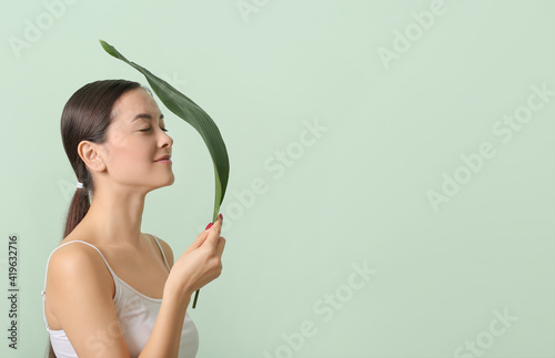 Beautiful young woman with ...