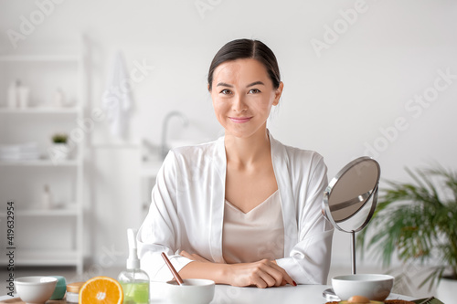 Beautiful young woman with ...