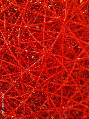 Foto Red plait interlacing. Chaotic intersection of red paths.