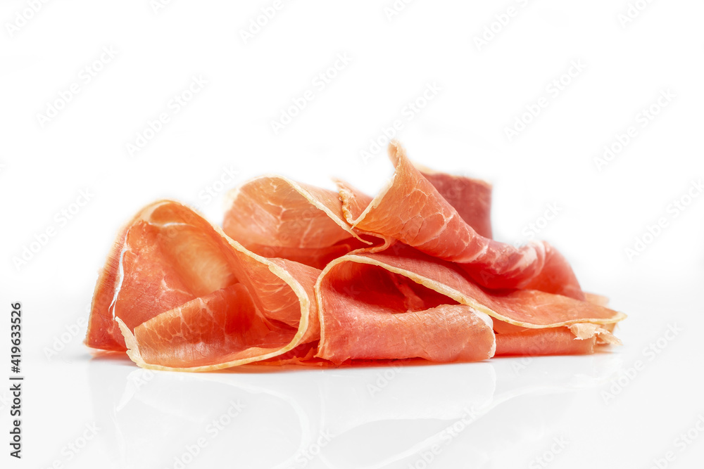 Dry Spanish ham, Jamon Serrano, Iberian ham Isolated on white background