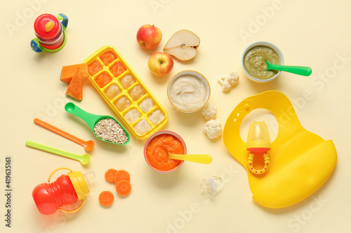 Composition with healthy baby food on color background © Pixel-Shot