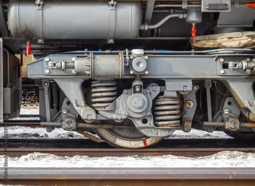 Railway bogie of small desel manoeuvring locomotive. Close-up. Railway bogie of small desel manoeuvring locomotive. Close-up.