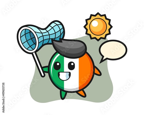 Ireland flag badge mascot illustration is catching butterfly