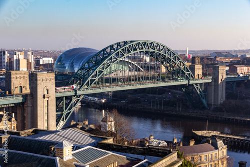Tyne Bridge in Newcastle Upon Tyne showing its full magnificent span on a beautiful sunny day