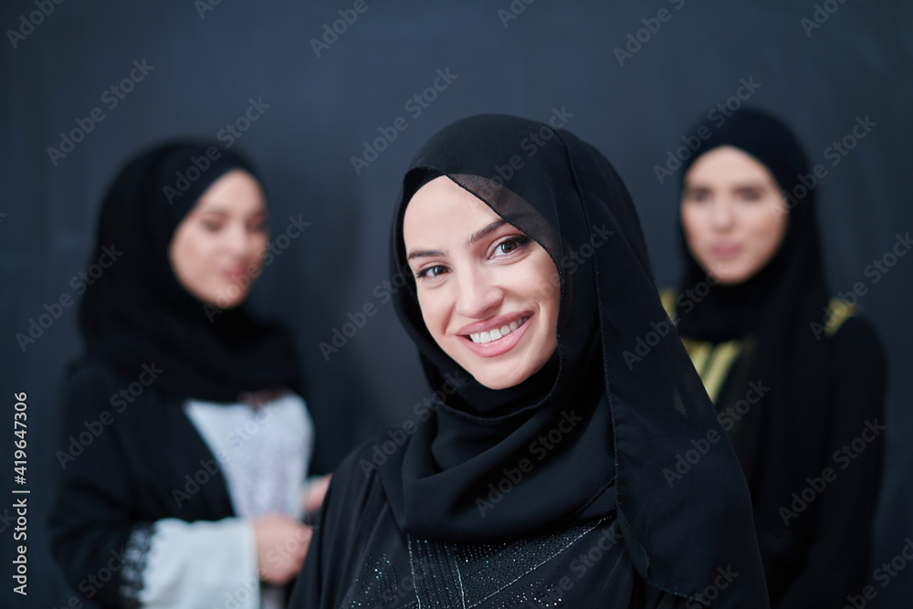Portrait of Arab women wearing traditional clothes or abaya