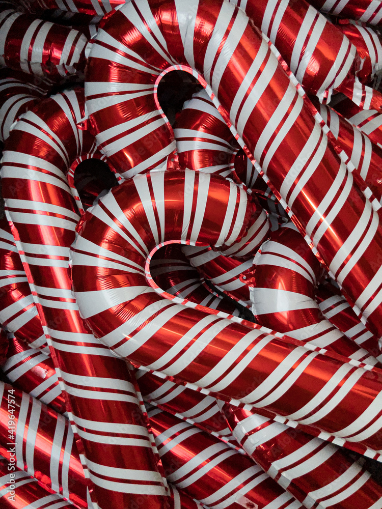 Candy cane foil party balloons background
