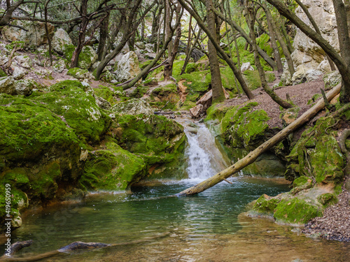 waterfall of Salt d'es Freu, a hiking area with waterfall near the village of  Bunyola on the balearic island of mallorca, spain photo