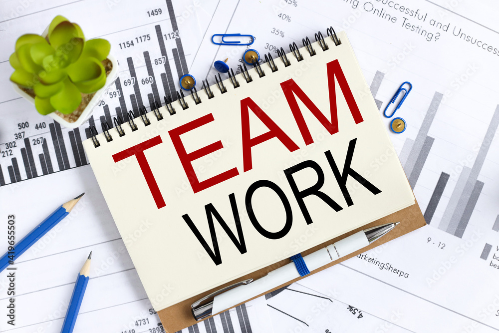 Teamwork. Text on white notepad paper on light background. Teamwork. Text on white notepad paper on light background.