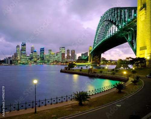 City skyline and the Sydney Harbour Bridge at dusk, Sydney, New South Wales photo