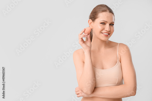 Beautiful young woman with ...