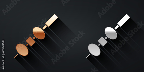 Gold and silver Olive and cheese on chopstick icon isolated on black background. Canape, tapas with cheese and olive. Long shadow style. Vector.