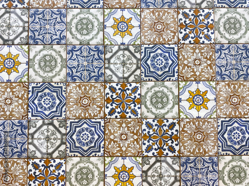 mosaic tiles with oriental patterns. Mosaic tiles texture for background. Beige ceramic tile mosaic. The texture of the marble under the magn up. Marble stone.