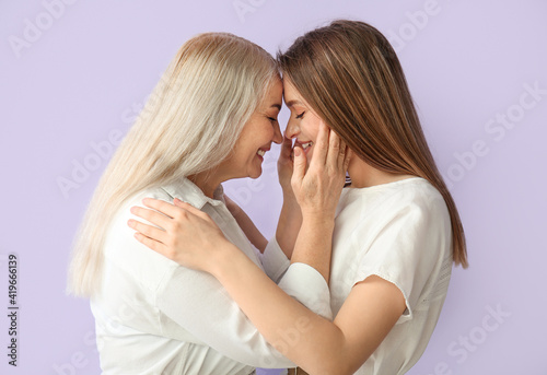 Portrait of young woman and...
