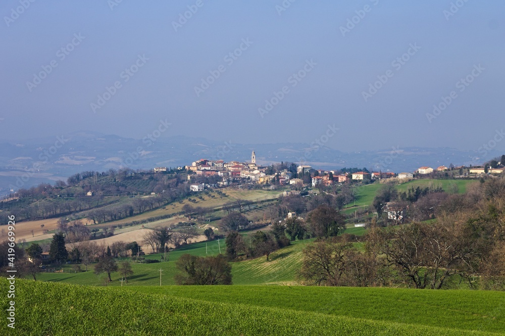 A medieval Italian village nestled in the Marche countryside (Marche, Italy, Europe)