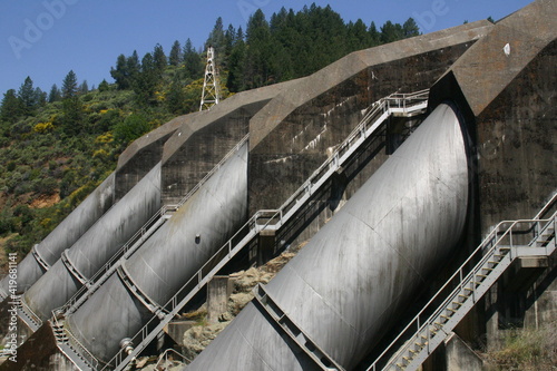 Shasta Dam California View of Sacramento River Penstocks carrying Water to the Turbines with Gravity making Electricity photo