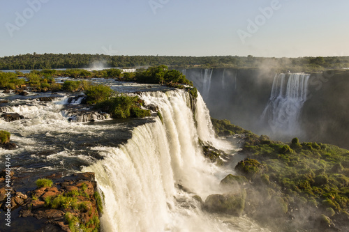 Iguazu Falls seen from above. It is a sunny day with blue sky. Foz do Igua  u  Brazil.