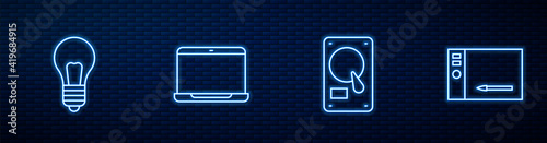 Set line Hard disk drive HDD, Light bulb with concept of idea, Laptop and Graphic tablet. Glowing neon icon on brick wall. Vector.