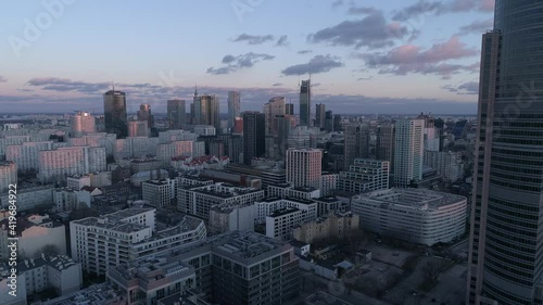 Skyline of a large city at dusk. High-rise buildings and skyscrapers in the drone video.