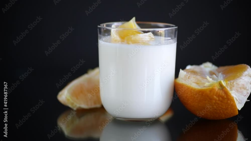 homemade sweet yogurt in a glass with oranges homemade sweet yogurt in a glass with oranges