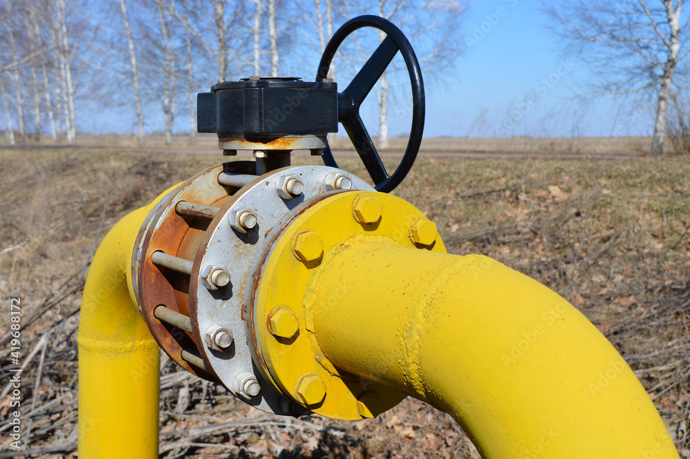 Main gas pipeline with a large flanged valve.