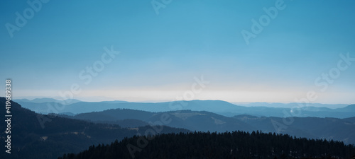 Amazing panorama background banner long from a fog landscape in the morning in black forest 