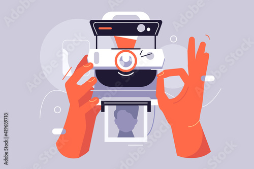 Old retro polaroid camera vector illustration. Hands holding device for taking pictures with instant photo card flat style. Technology concept. Isolated on grey background