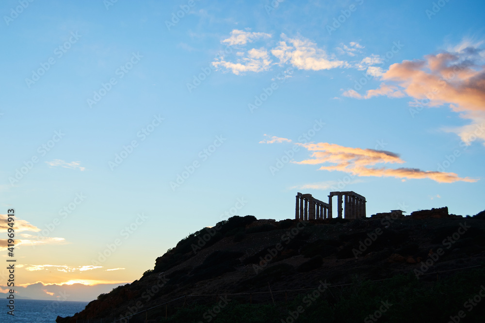A silhouette of the temple of Poseidon