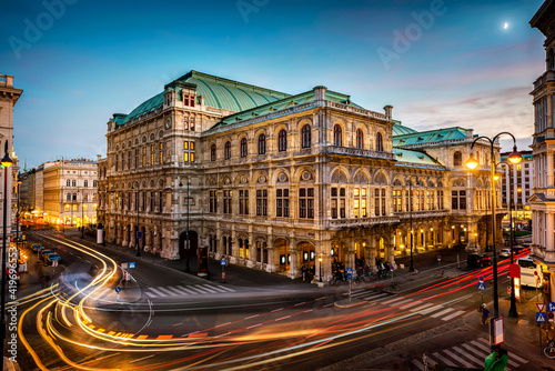 Vienna State Opera. Veinna, Austria. Evening view. The historic opera house is a symbol and landmark of the city of Vienna.  Panoramic view, long exposure.
