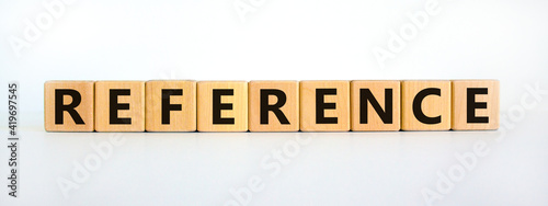 Reference symbol. Wooden cubes with the word 'reference'. Beautiful white background. Business and reference concept. Copy space. photo