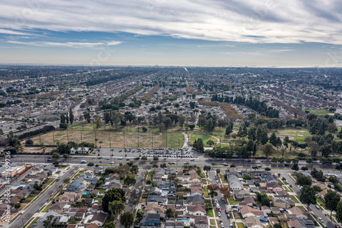 Drone Aerial View Suburban Coastal California Neighborhood. Single Family Homes Near A Park and Ocean