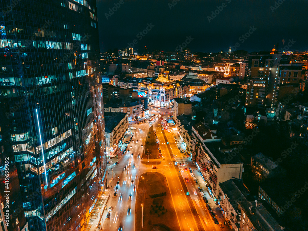Obraz premium Aerial view from a drone of the business center of the capital of the metropolis Kyiv at night