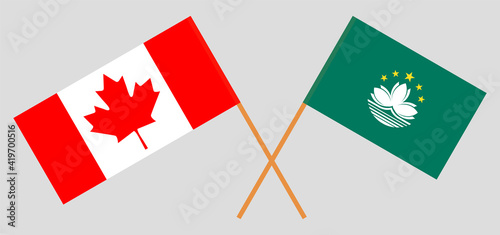 Crossed flags of Canada and Macau. Official colors. Correct proportion