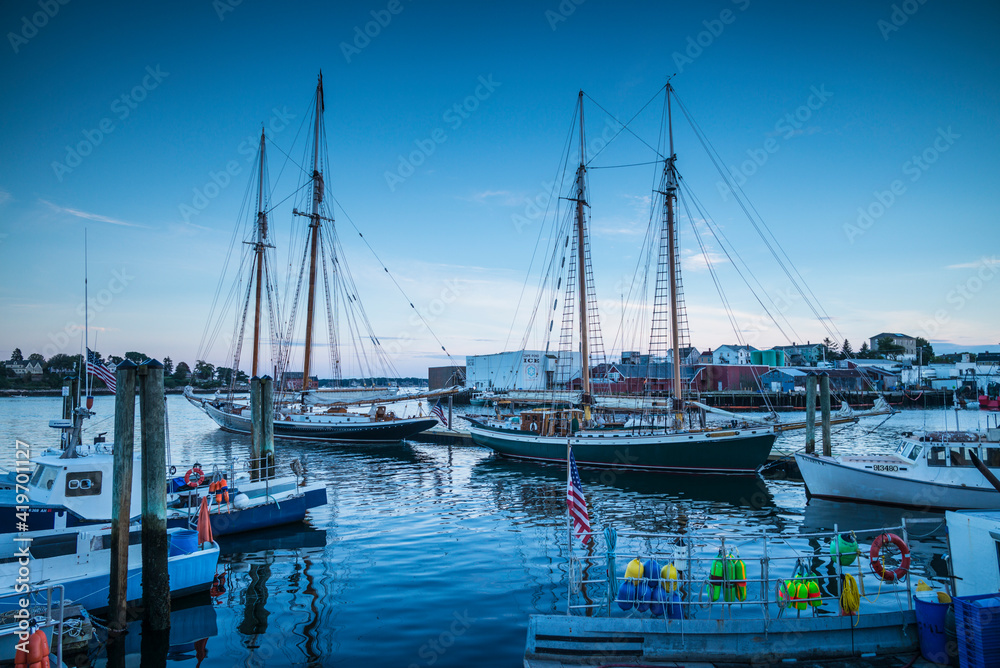 USA, Massachusetts, Cape Ann, Gloucester. Gloucester Schooner Festival, schooners at dusk