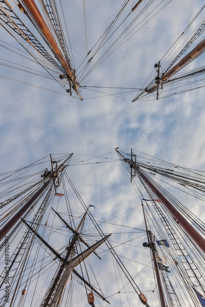 Fototapeta premium USA, Massachusetts, Cape Ann, Gloucester. Gloucester Schooner Festival, schooner masts.