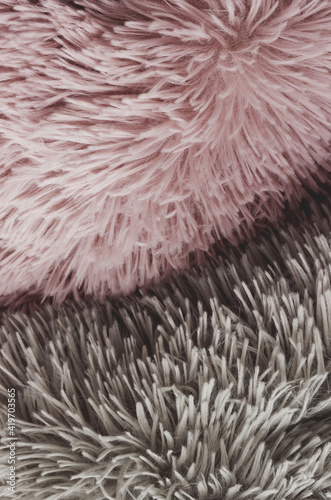 Close-up view of fluffy pillow. Cozy background texture.